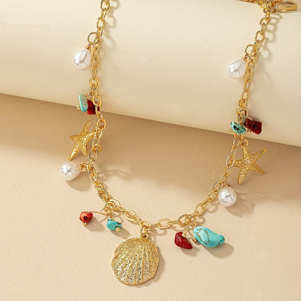 Kustparel en Turquoise Schelpenarmband